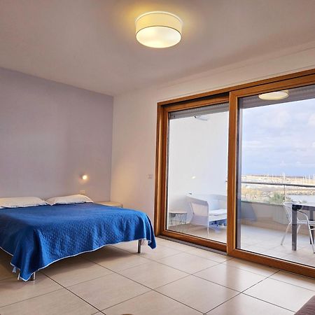 Dolphin'S Home Porto Torres Esterno foto
